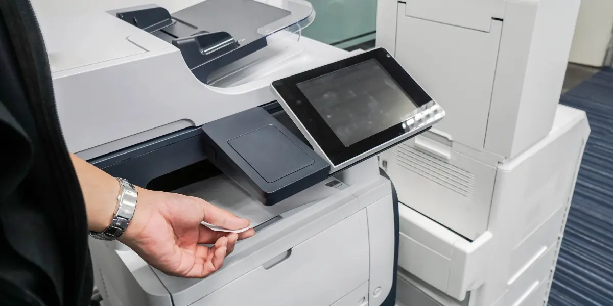 Man using copy machine