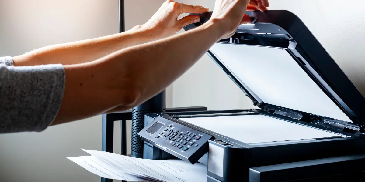 Person using copy machine